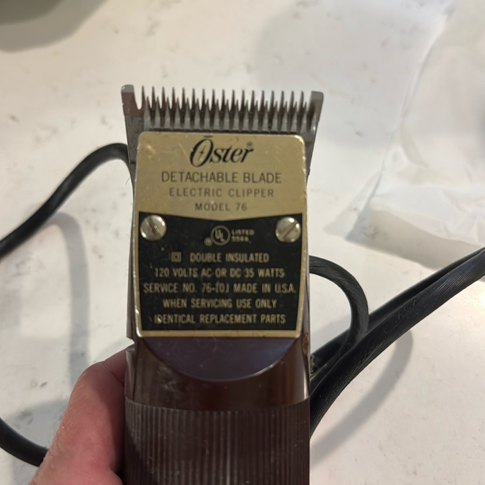 Oster old school clippers unused in years!!! If you are a barber you know.